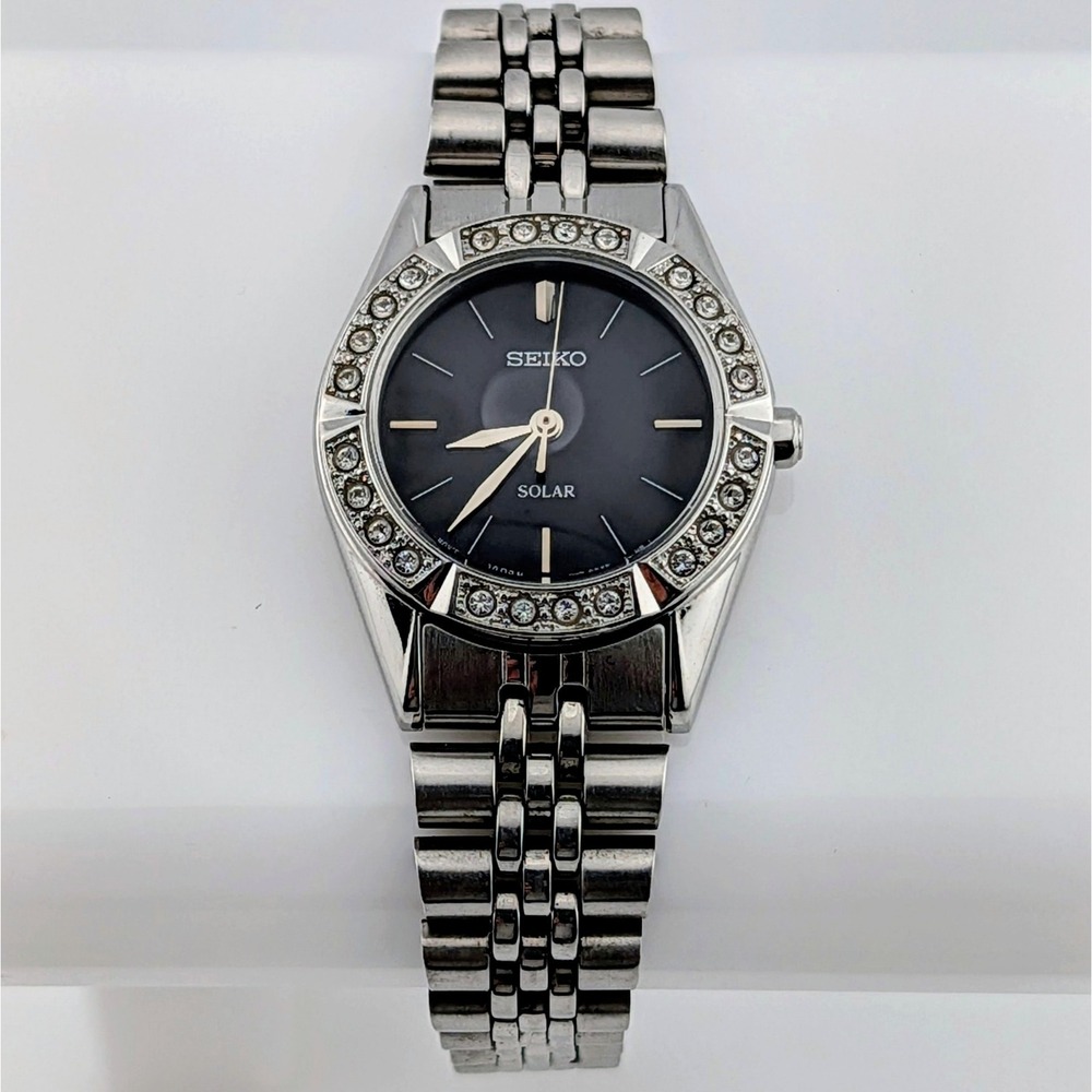 Seiko SUP091 Solar Swarovski Crystal Bezel Black Dial Women's Watch 25mm 6.25"